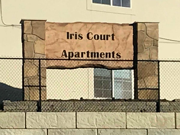 Iris Court Apartments Sign